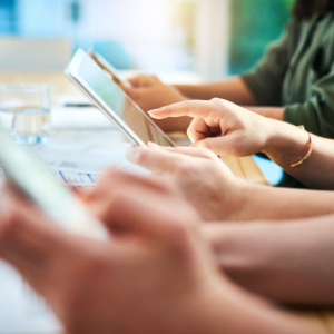 Hands of people holding tablets